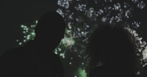 Couple Playing With Sparklers