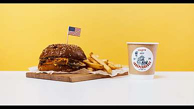 burger and fries with a sparkler