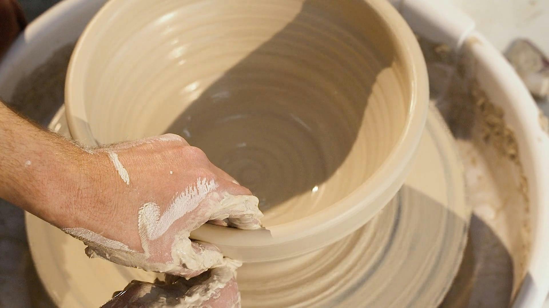 CloseUp Video Of Man Molding Clay Pot · Free Stock Video
