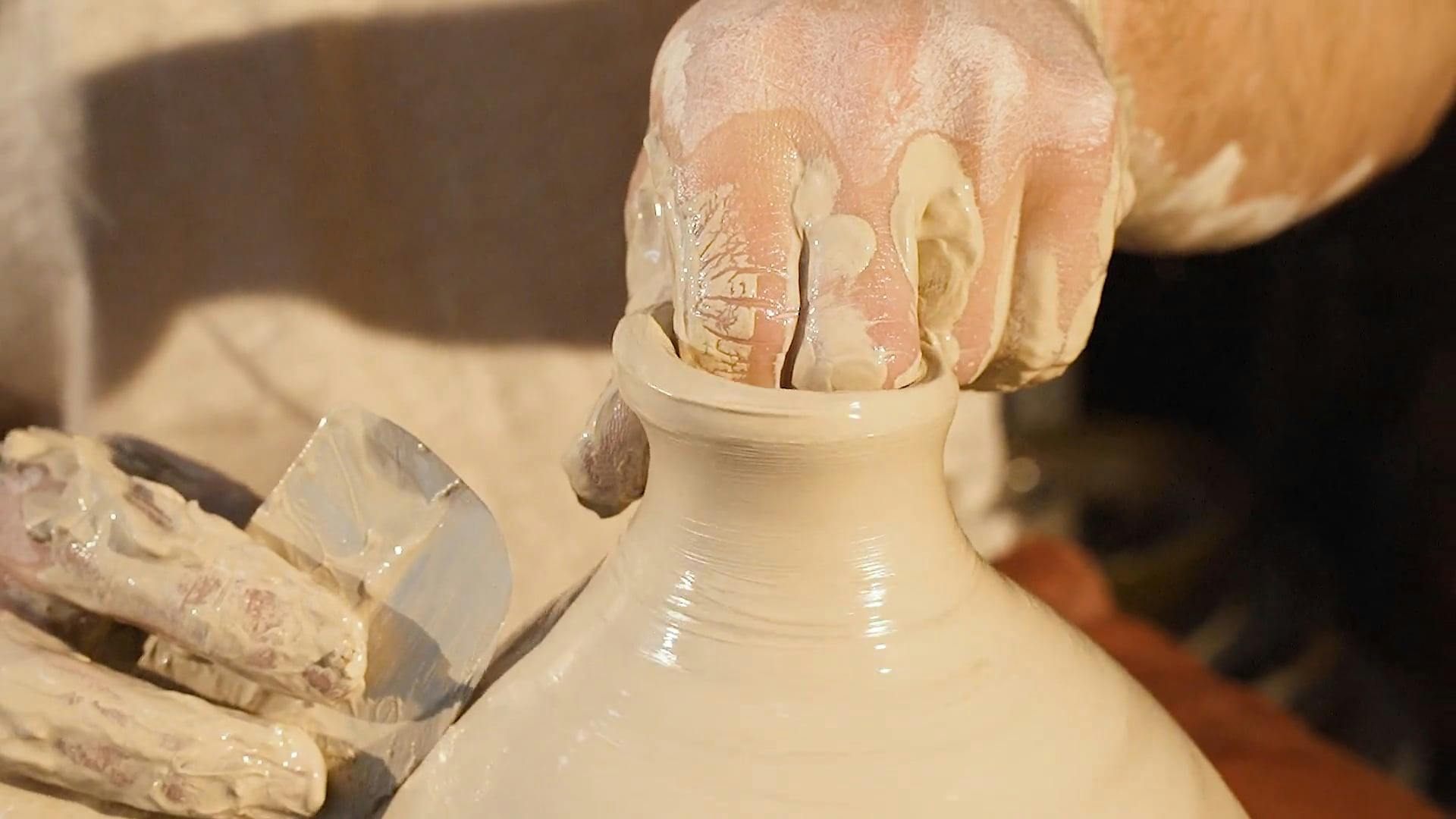 Video Of Man Molds The Tip Of A Clay Pot · Free Stock Video