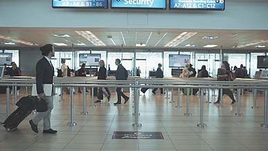 video of people walking around airport