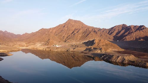 Barren Mountain Near A Body Of Water