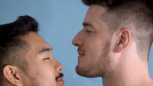 Close-Up View of Men Couple Kissing Each Other