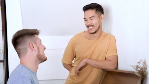 Men Couple Talking to Each Other Happily