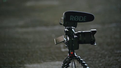 Black Modern Camera On A Tripod