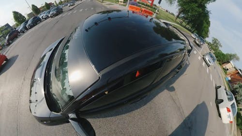 Footage Of A Moving Black Car With Fisheye Lens