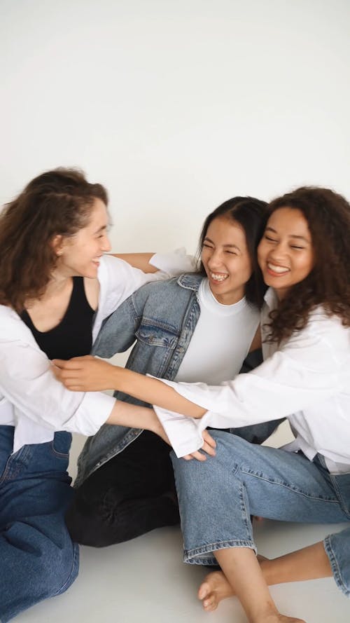 Three Women Hugging Each Other