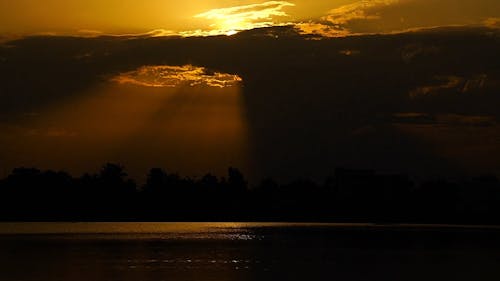 A Cloudy Sunset on the Lake