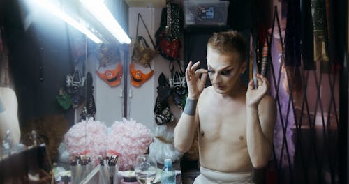 Drag Queen Removing False Lashes and Removing Makeup