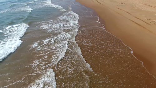 Beach Waves Rushing To Shore