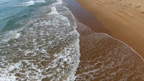 Drone Footage Of Waves Rushing To The Shore