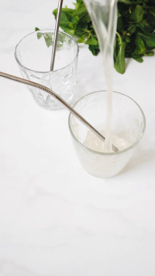 Close-Up Video Of Person Pouring Juice On Glass