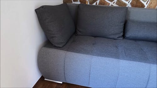 A Modern Gray Sofa In The Living Room