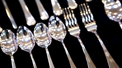 Spoon And Fork Silverwares In Close-up View
