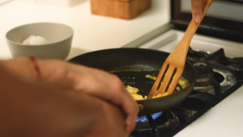 Video Of Person Cooking Egg