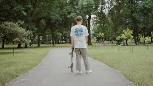 Young Man Doing Skateboard Tricks