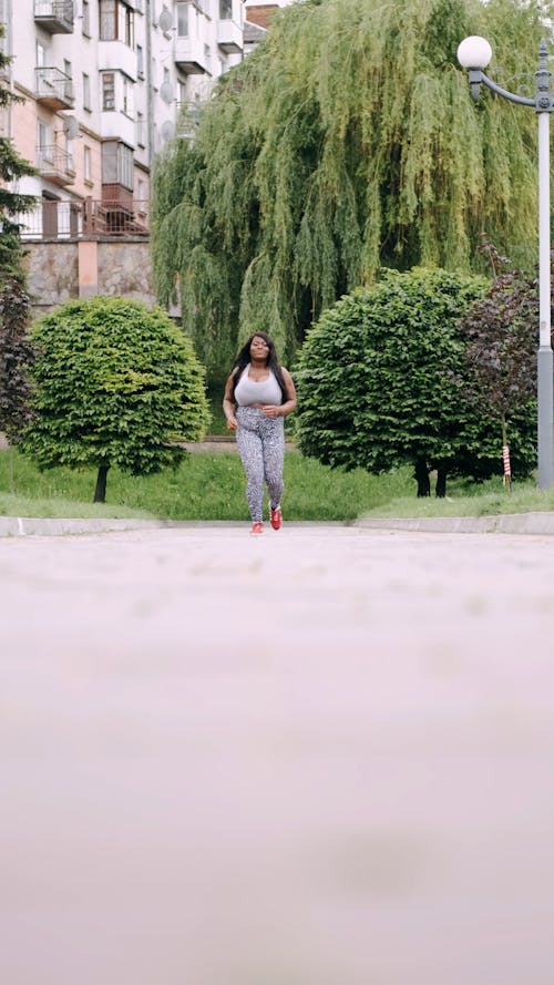 Low Angle View Of A Woman Jogging