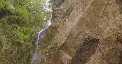 The Sun Rays Through The Gap Of The Rocks Formation