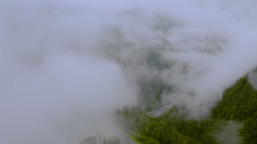 Drone Footage Of Mountains On A Foggy Day