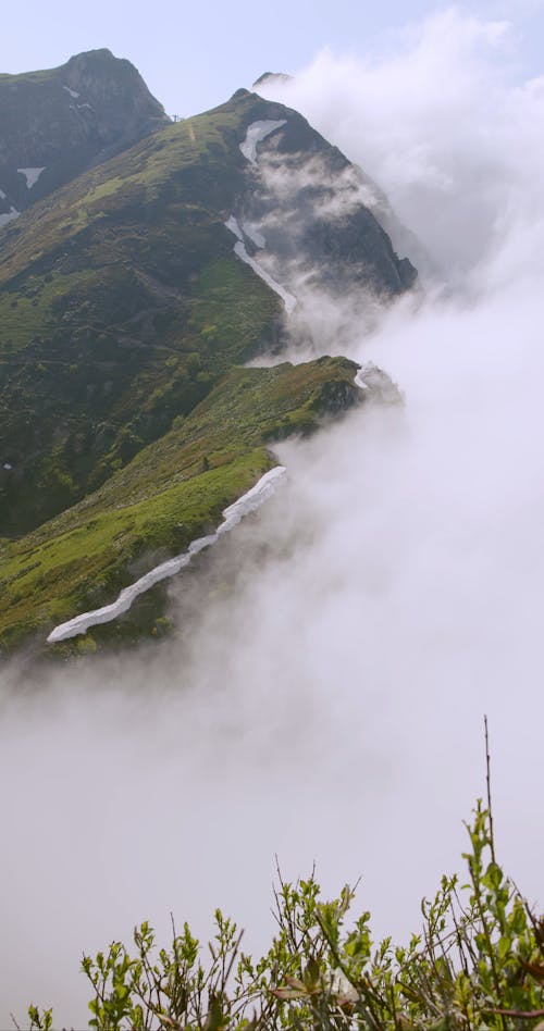 Video Of Moving Clouds Beside Mountains 