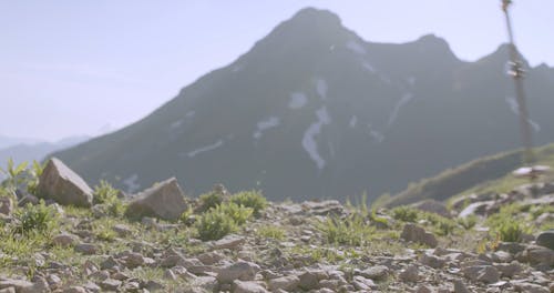 A Couple Hiking A Mountain