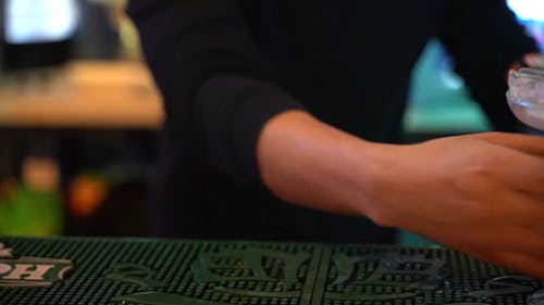 A Bartender Preparing A Cocktail Drink