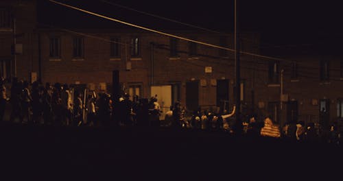 People Protesting In The Street During Nighttime