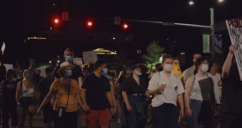 People Marching On The Street In Protest