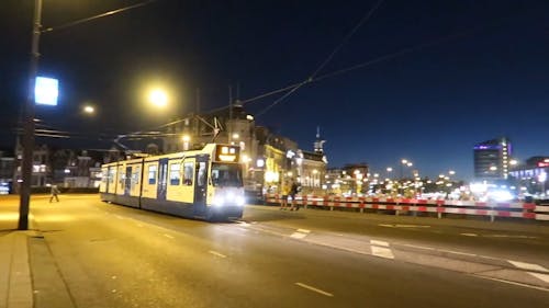 The Illuminated Amsterdam Centraal Station at Night