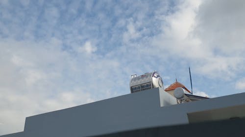 A Water Tank Built On A Rooftop