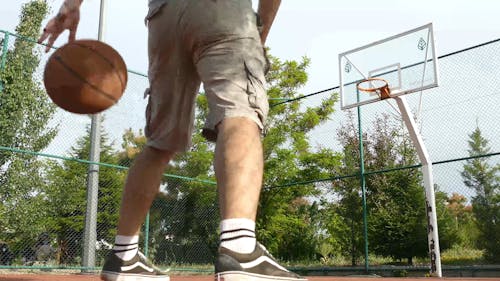 Video Of Man Playing Basketball Outdoors