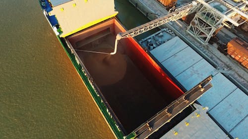 Loading Coals On A Cargo Ship Hatch