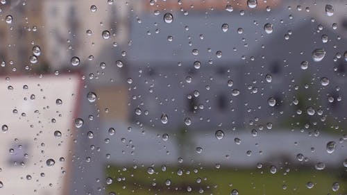 Droplets Of Water Over  Glass Surface