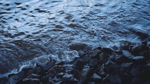 Waves Breaking On The Rocky Shore