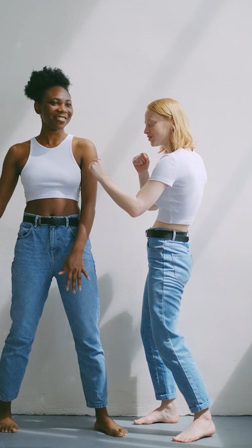 Two Women Dancing and Hugging