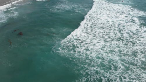 Sea Waves Rushing To The Beach Shore