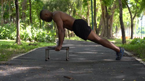 Topless Man Doing Push-Ups