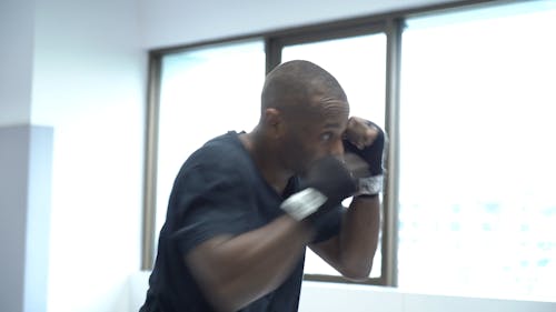 Man in Black Shirt Punching