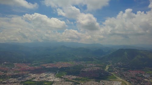 Drone Footage Of Village Near Mountains