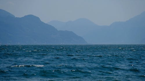 Seascape Scenery Against Mountain Background