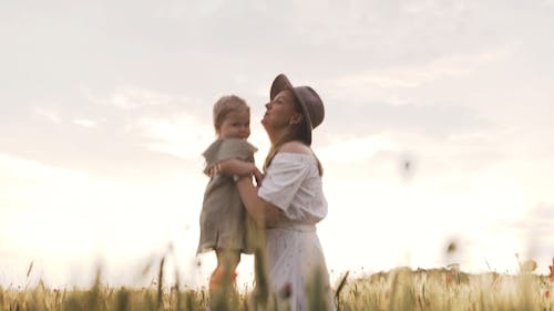 Woman Playing With Her Baby