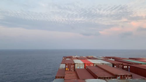 Cargo Ship Transferring Container Of Good At Sea