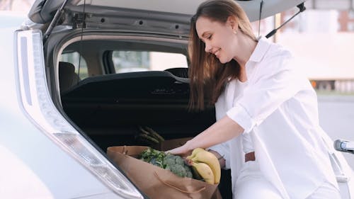 A Woman Shopping For Fresh Fruits And Vegetables