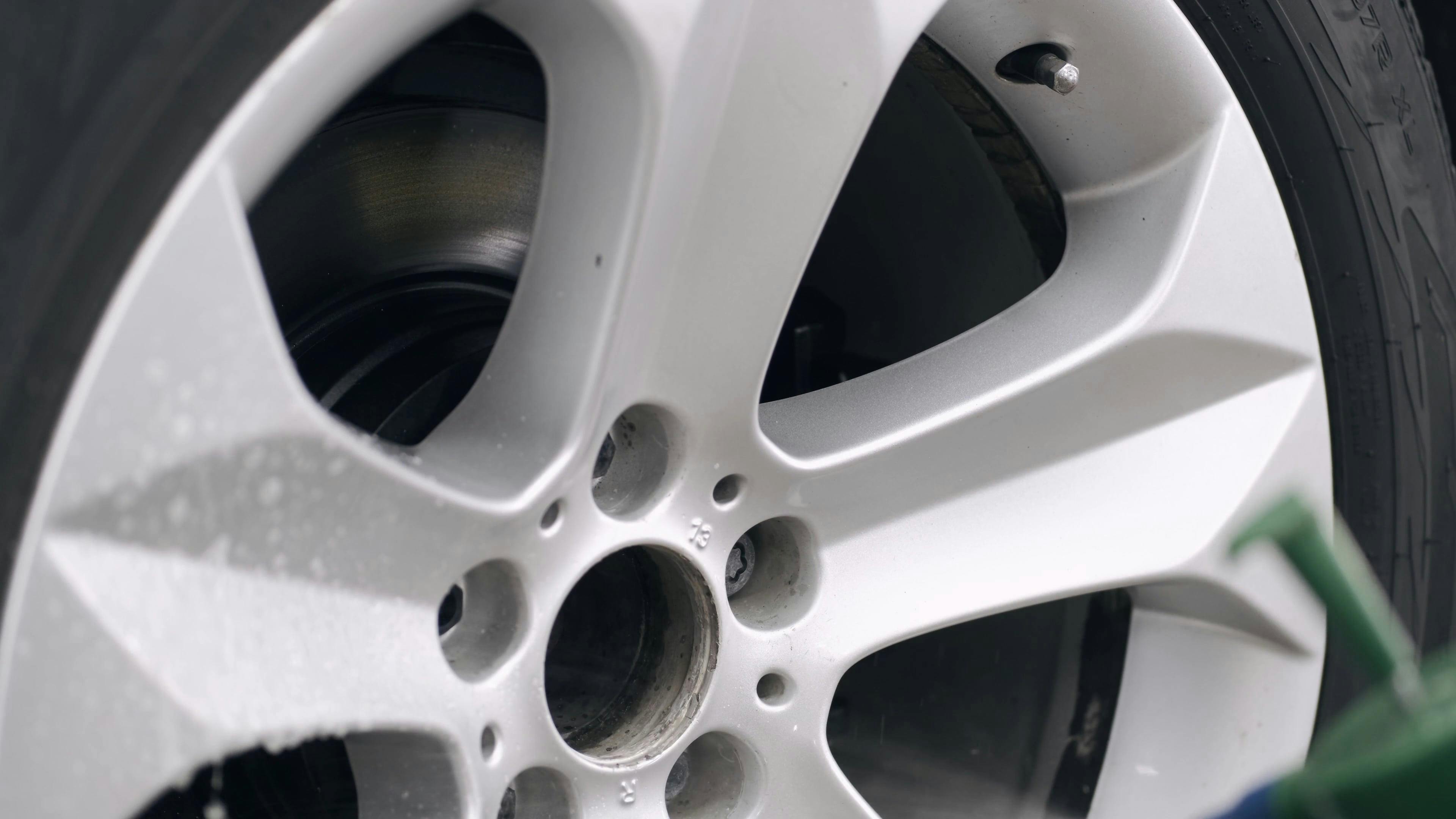 Person Cleaning Car Wheel \u00b7 Free Stock Video