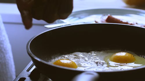 Person Cooking Breakfast