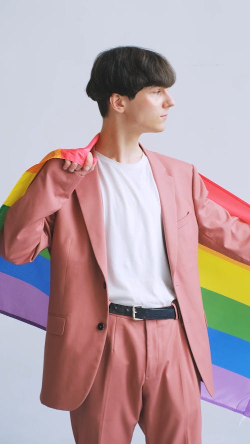 Man Holding a Gay Pride Flag