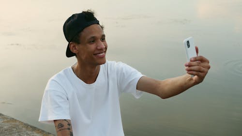 A Young Man Taking a Selfie Photo