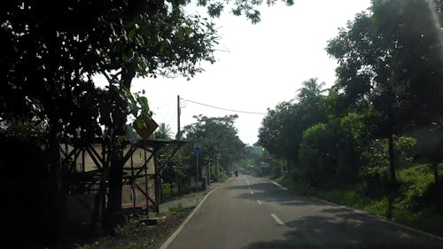 Traveling A Narrow Road In A Rural Area