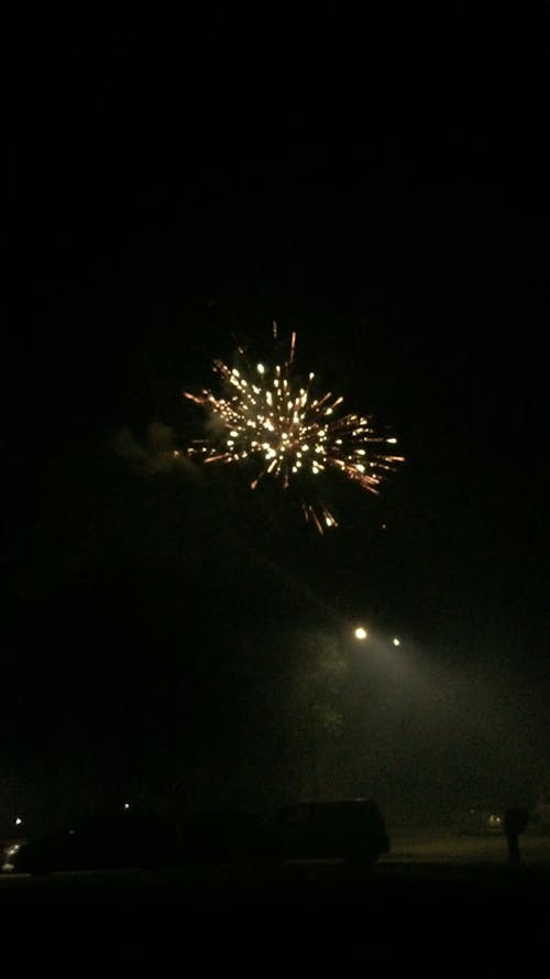 Bright Sparkles From Fireworks Exploding In The Air