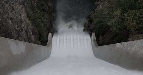 A Dam Built On A Mountain River 